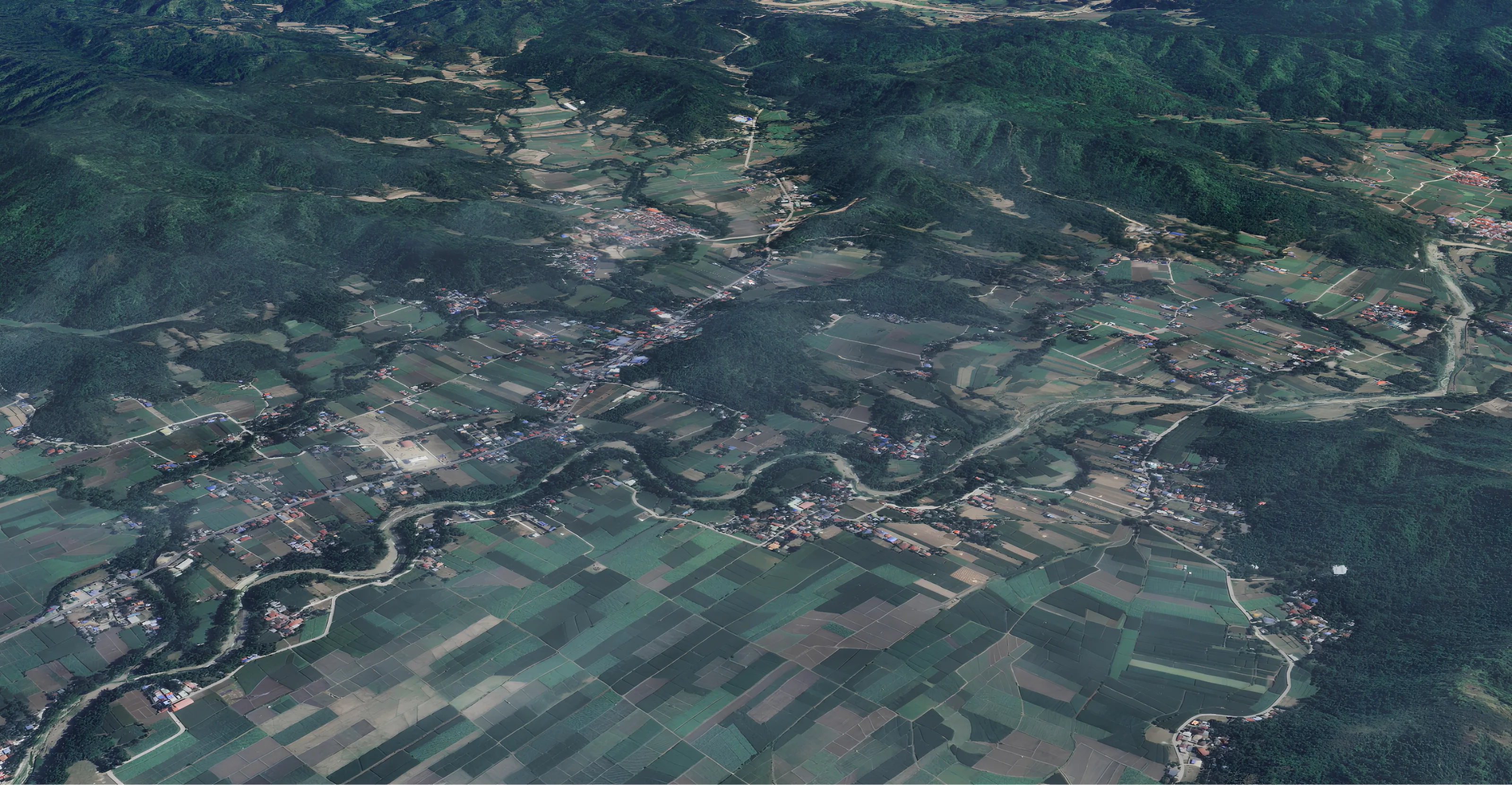 Satellite map of Banayoyo, the whole valley, with the Naguimba–Cadanglaan River running through it.